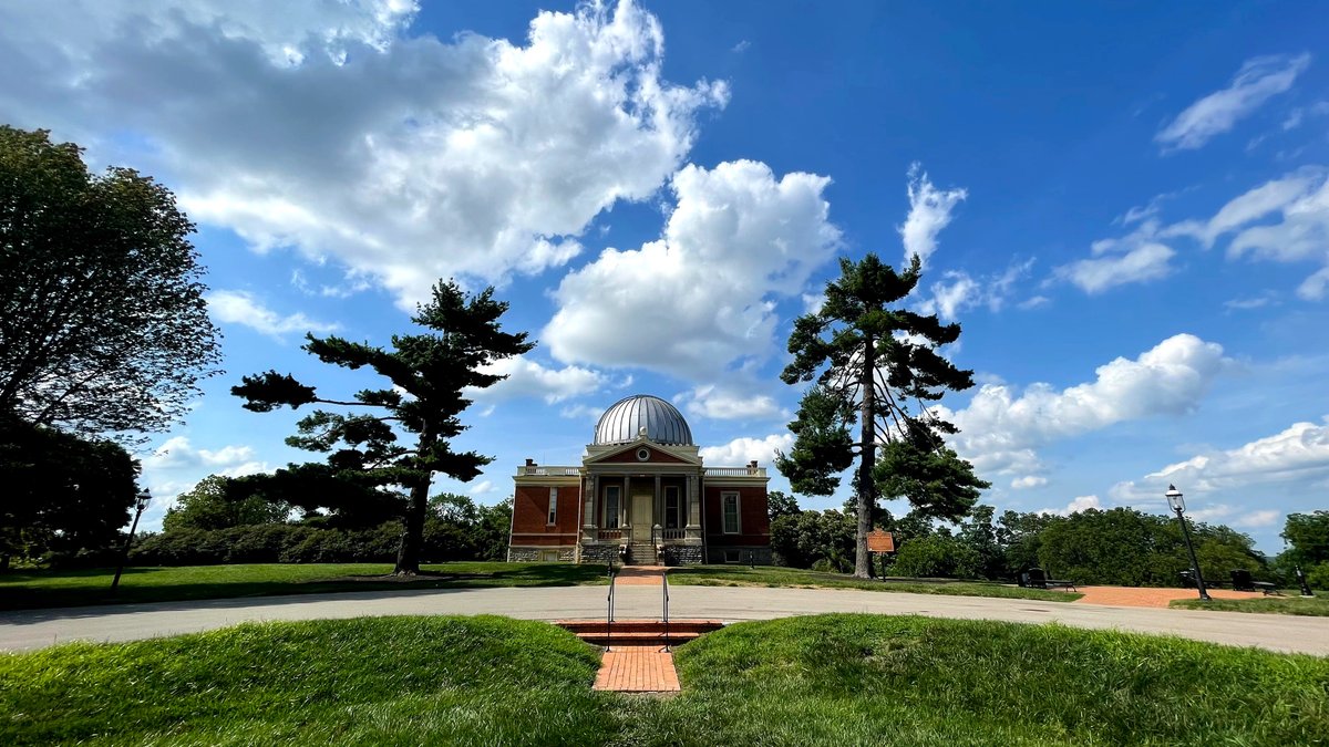 ScottDimmich's tweet photo. PHOTO OF THE NIGHT: Cumulus clouds over the @CinObservatory. Taken in June 2021.
#cincinnatiobservatory #mountlookout #cincinnati https://t.co/BU06Xbr8WM