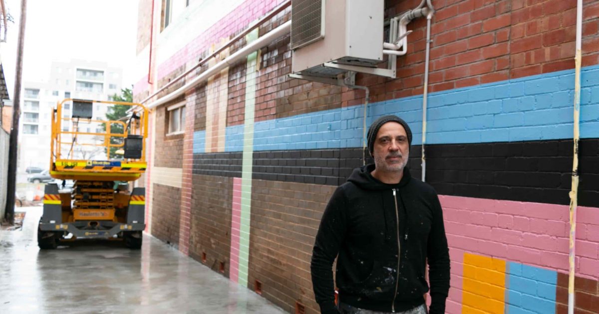 RegionCanberra's tweet photo. The artist behind Civic's #BigSwoop sculpture is hoping for better luck with his latest project - bringing to life one of #Queanbeyan's alleyways with a nine-metre-high mural https://t.co/4DrFq6fzcU https://t.co/xy9bsdmxwe