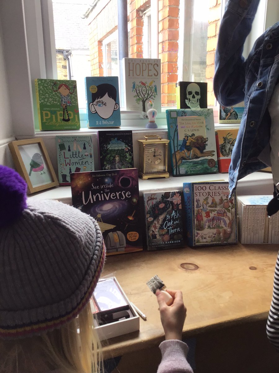 The 9yo has made a library today. She has turned into someone called Ramya Hatmaker, inspired by her two current favourite books <a href="/BooksandChokers/">Elle McNicoll ✍🏻📚🩷💜💙</a> <a href="/tamzinmerchant/">Tamzin Merchant *isn't on social media very much*</a>