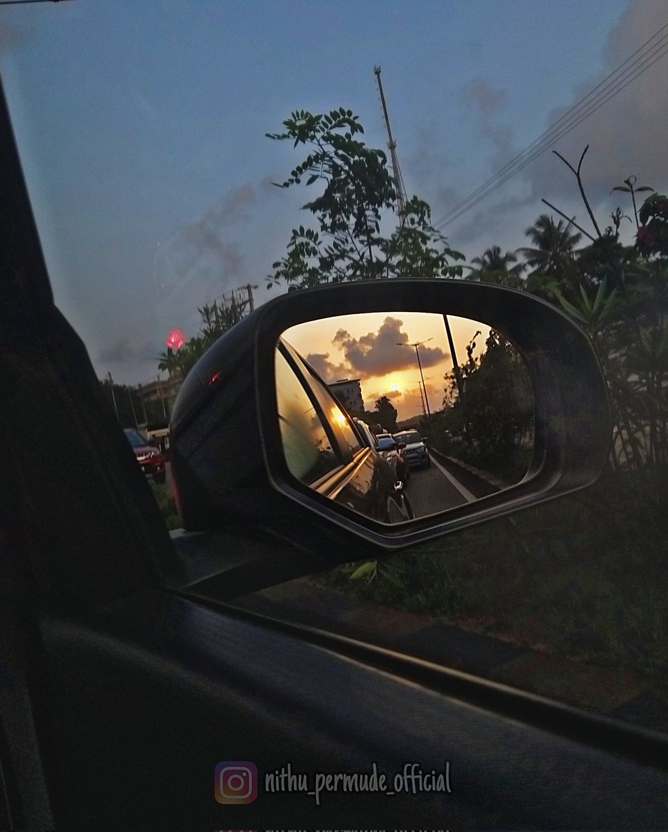 #sunset #sunsetphotography #rearviewmirror #UrbanCruiser #mobilephotography #nithupermudephotography