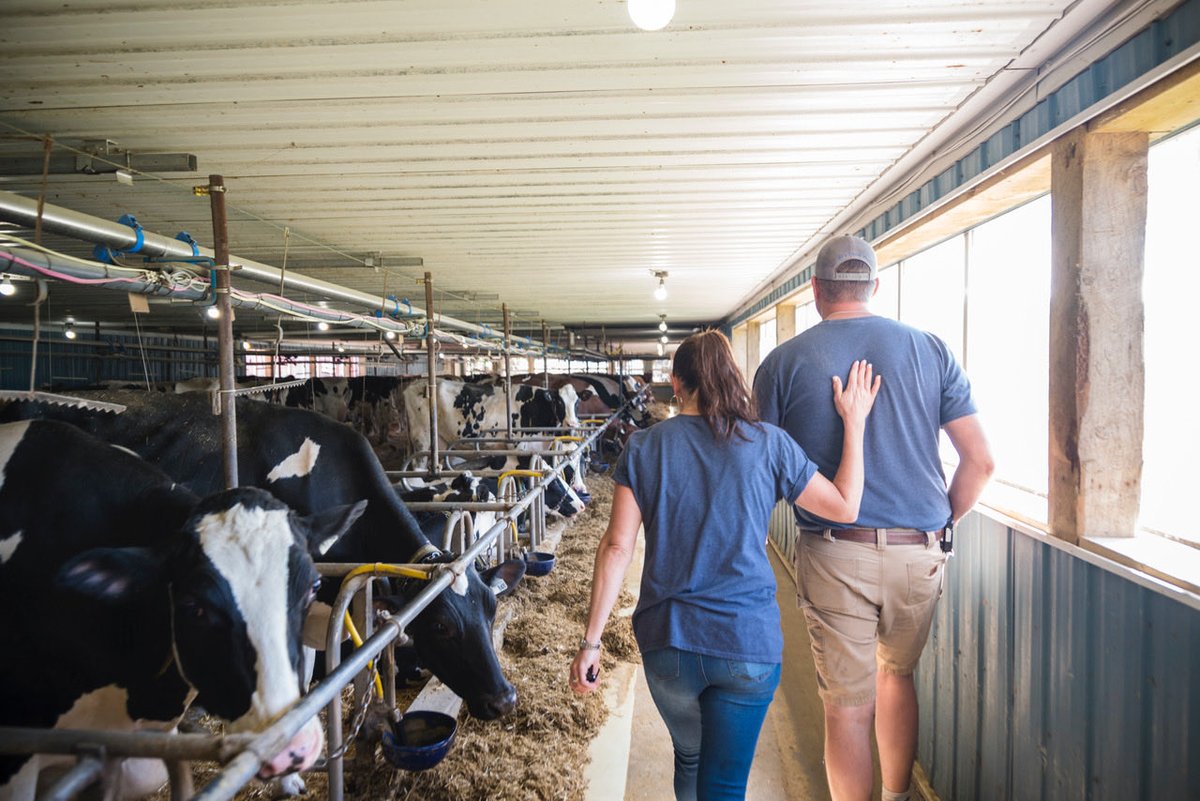 Someone captured this picture the other day as we were walking through the barn. It sums up everything we are as husband and wife and also business partners. No matter the situation we have each other’s backs.  #farmingfamily #workandplaytogether