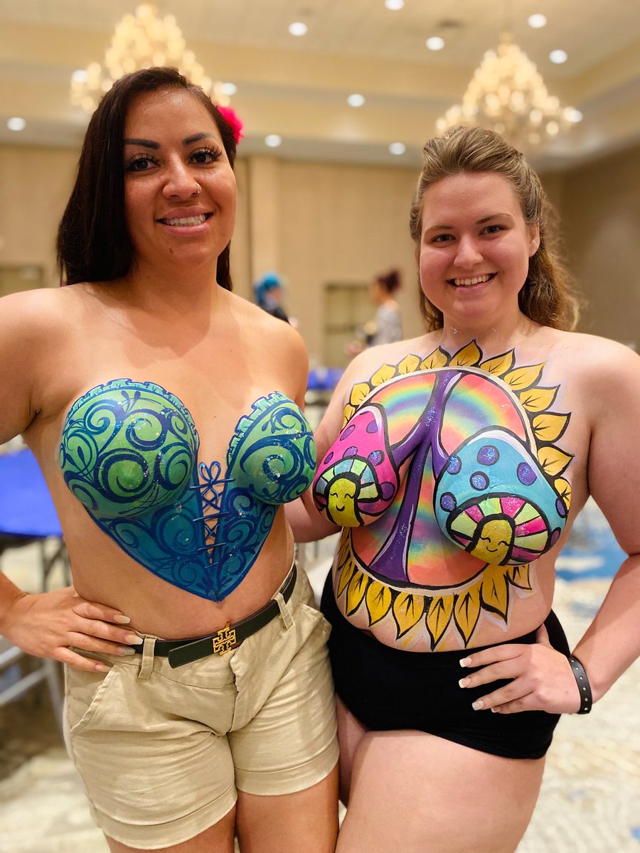 I taught a festival body painting class at #fabaic and everyone did such amazing designs! Mine in the corset top and Chela Waterfield’s on right. #bodypaint