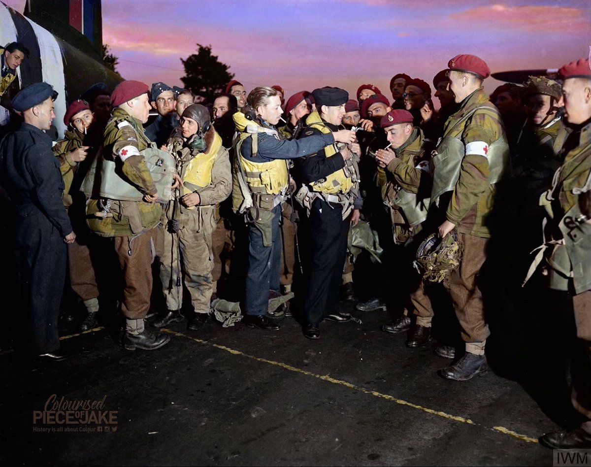 Paratroopers of 6th #AirborneDivision, including members of the Medical Parachute unit, enjoy a last #cigarette with their #RAF #aircrew before boarding their transport into #Normandy, #France, #6June, 1944.

#dday #britishairborne #WWII #WW2 #c47 #normandie #operationoverlord