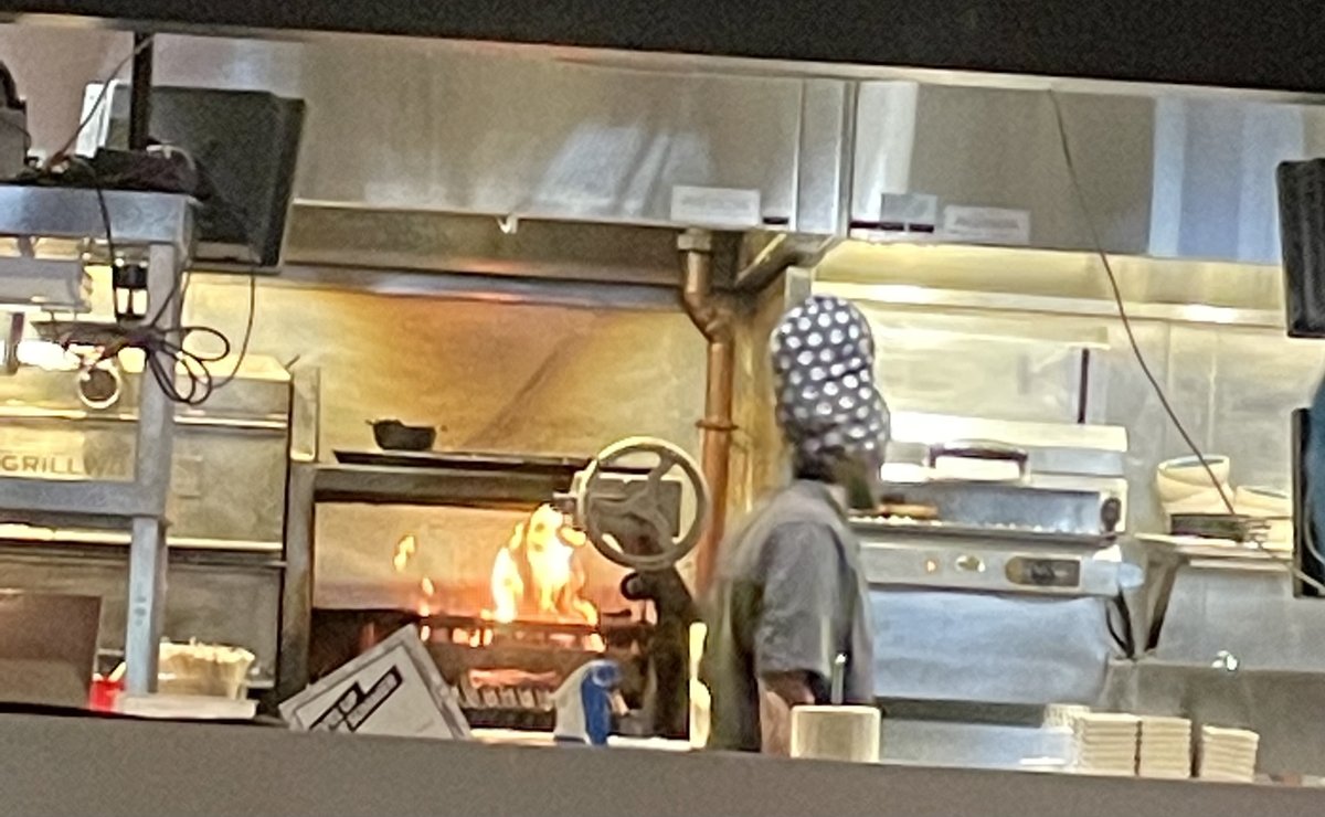 SourdoughSusie's tweet photo. Went out to eat last night. I had full view of the kitchen. Couldn't take my eyes off this guy in the chef's hat. #ChefsHat https://t.co/BZQjn4v7OH