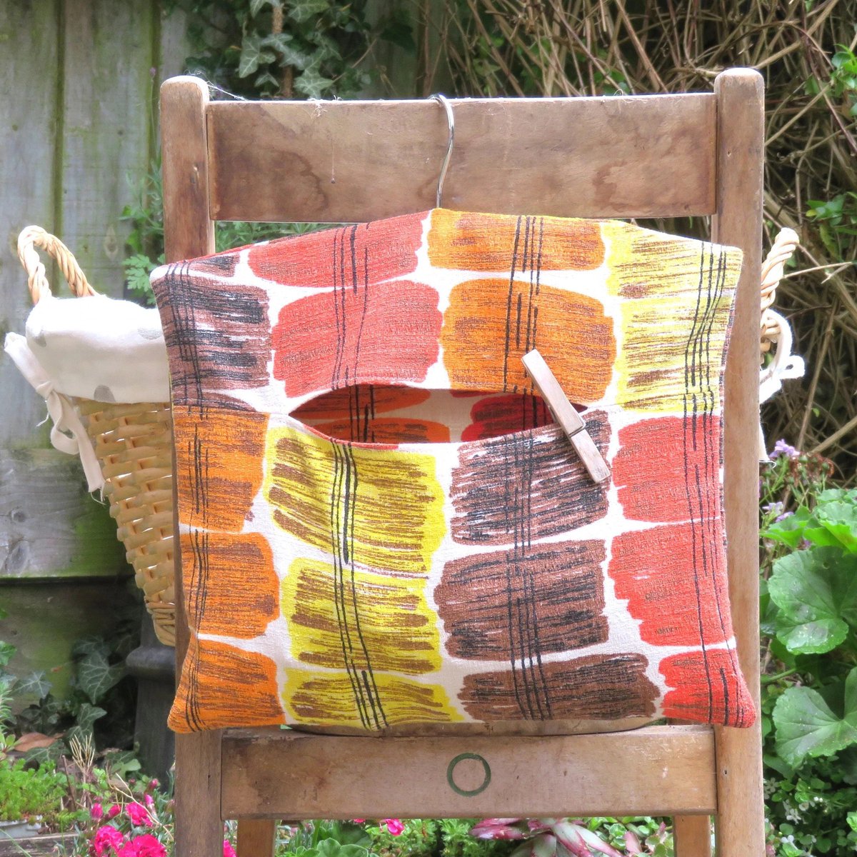 Excited to share this new peg bag from my #etsy shop which is upcycled from a vintage bark cloth curtain.   etsy.me/3avXkIx