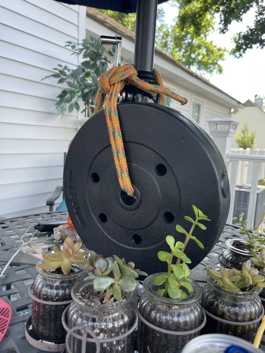 When you tie a 20Lb weight to your umbrella to keep it from blowing away.