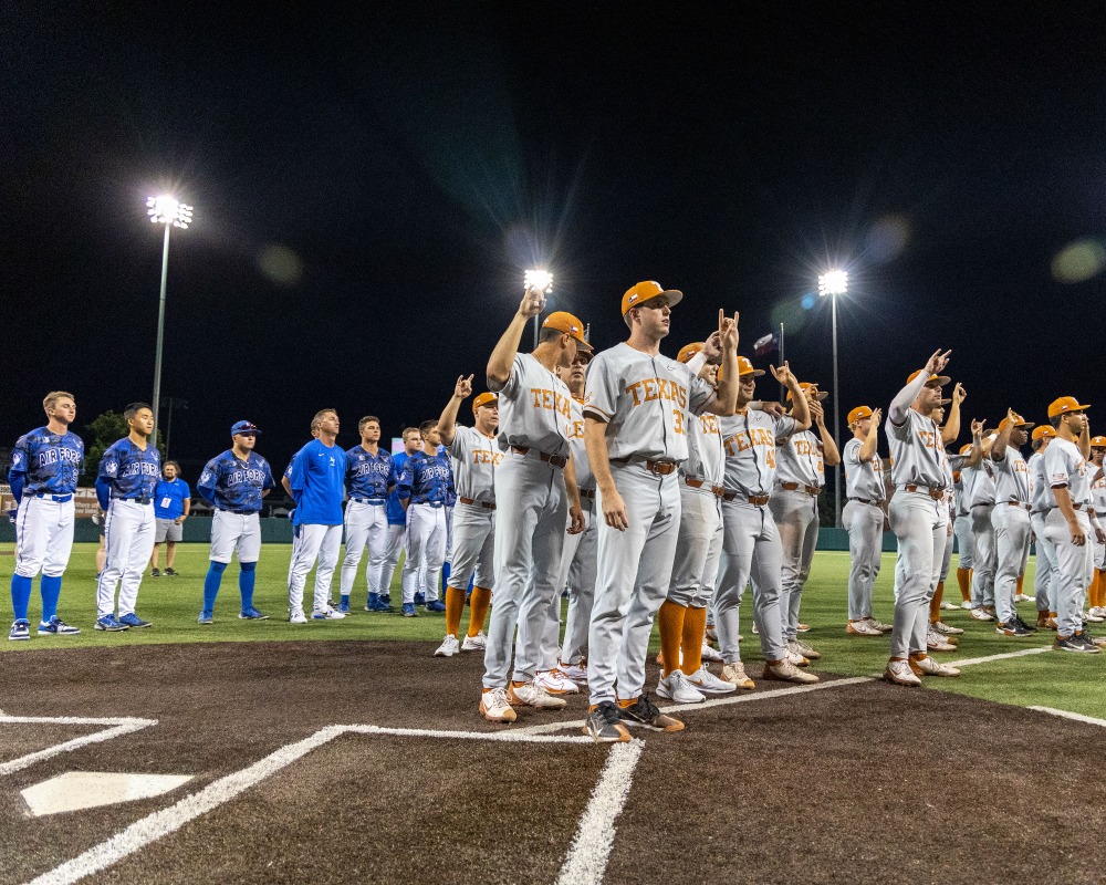 Air Force stands behind Texas as the Eyes of Texas is being sung.

Fans chant USA USA USA 🇺🇸