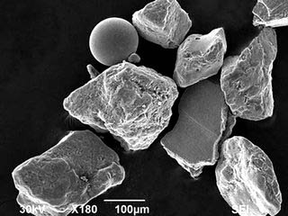 rgpoulussen's tweet photo. Four percent of the sand on Normandy beaches is shrapnel that has been broken down over the decades into sand-sized chunks. See the smooth sphere? It's shrapnel, sanded down to a smooth, microscopic ball. #WW2 #HISTORY https://t.co/fSOs9Hj2SG