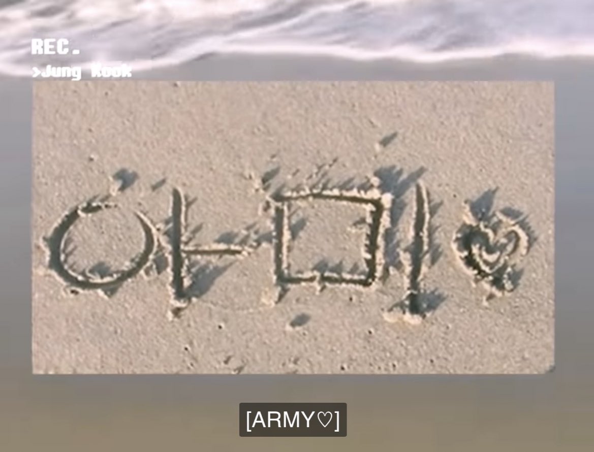 Taehyun and Jungkook writing Moa and Army on sand 😞🖤