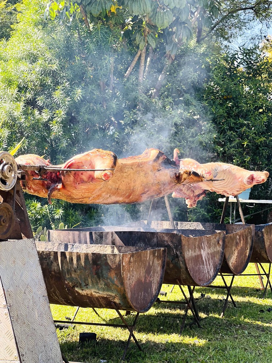 UeBbq's tweet photo. Pig On Spit , these 2 were 70kgs each https://t.co/BYeDkrKkog