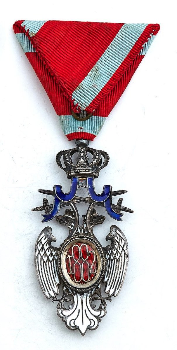 Serbian Order of the White Eagle (Original)He was given this medal because he donated millions to serbian children who were refugees in the wars of ex Yugoslavia and to renovate 2 children hospitals in Serbia and rebuilt 1 in Bosnia.