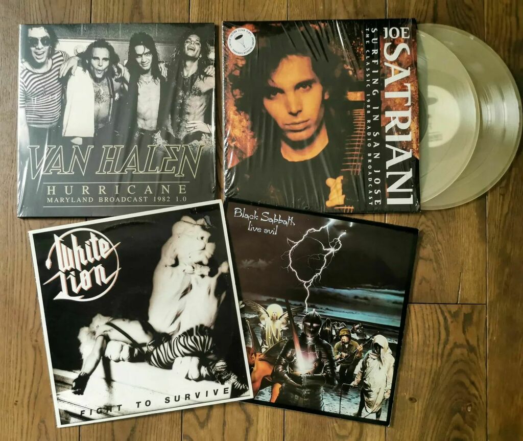 rick_bouwman's tweet photo. 2nd catch of the week at yesterday's fair.
@joesatriani
@vanhalen
@blacksabbath
#whitelion
#vinylcatch #vinylporn #metalhead #metalmusic #heavymetalbands #joesatriani #blacksabbath #dio #vanhalen #bootlegs #vinylcollector #additions #heavymetal #rock #… https://t.co/wPX6Lu0EnK https://t.co/U0ak5IN8YW