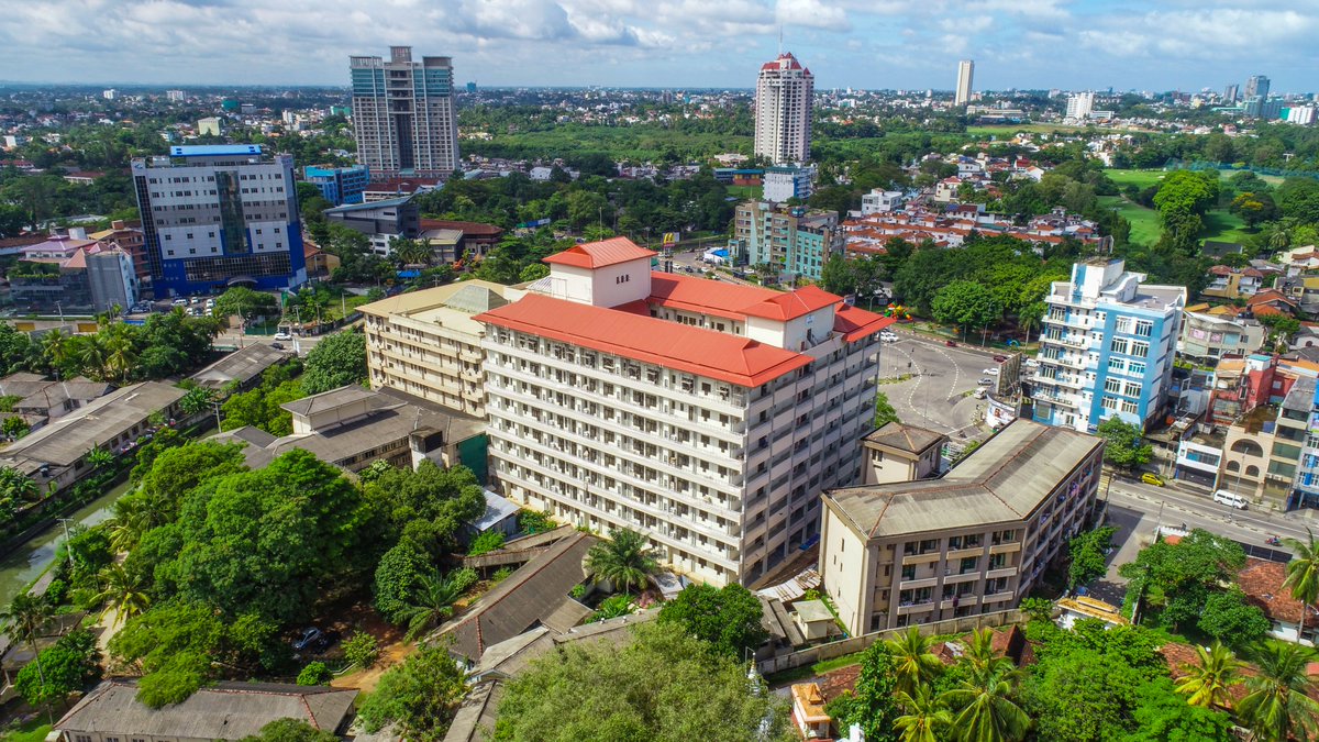 EngineeringMaga's tweet photo. Photo of the week: Ayurvedha Teaching Hospital, Borella. Bright red rooftops stand out in the city. The oldest and largest Ayurvedic hospital in #SriLanka saw an upgrade in 2018, as MAGA designed and constructed an expansion upgrading it to the status of a teaching hospital. #lka https://t.co/n2DLQiA4oo