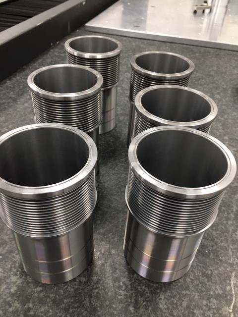 AandMEDM's tweet photo. #CNCTurning wet liners &amp; parts for A+5 engines. Our expert #CNCturners achieve precise cylindrical dimensions &amp; contours. 
#turnedparts #Mini16v #Aseries #enginebuild #CNCmachining #precisionengineering #gbmfg #UKmfg https://t.co/9oBP1787jC