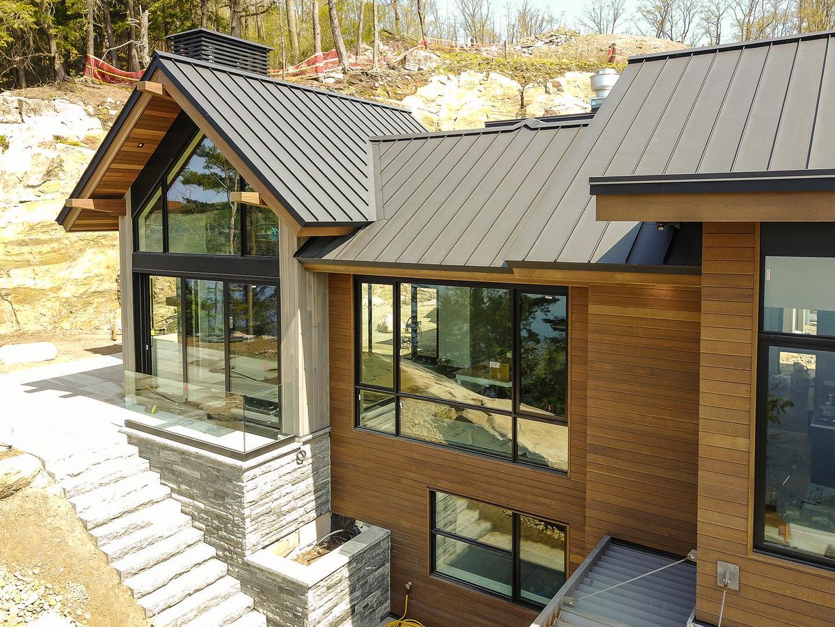 SapphireRoofing's tweet photo. Breathtaking Cottage with new Standing Seam Roofing and black ACM detailing 🔥

Ready to elevate your home or cottage with a Standing Seam roof or ACM Panels?

Book a free estimate now!
https://t.co/KZK8Bijv4o

#acm #black #standingseam #metalroofing #roofing #Barrie #Muskoka https://t.co/l5JUrNfoOI