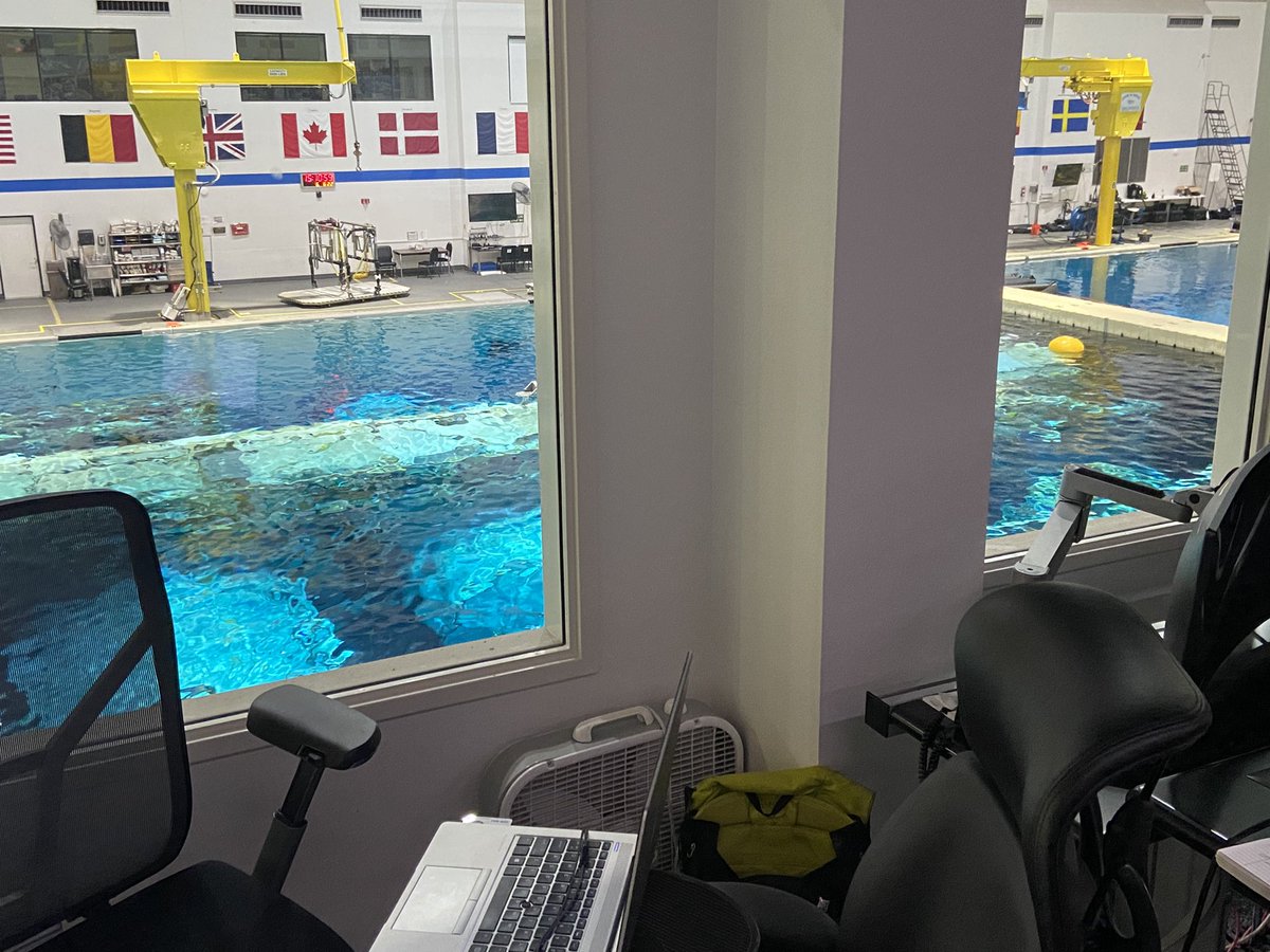 makincaid's tweet photo. My temporary office space as I went thru my day. Iβm down at JSC watching college students test their ideas in the NBL #microgNeXT #ArtemisStudentChallenge #NASASTEM. The pool in the background, the NBL is 200β long, 100β wide and 40β deep. Amazing feat of engineering! https://t.co/yVNz9ef9zY