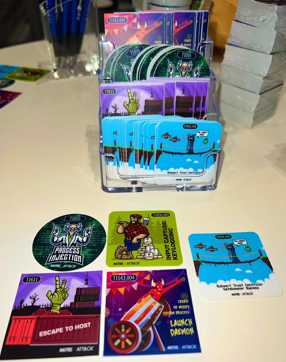 MITREattack's tweet photo. We’re on the ground at #RSAC finishing booth prep in Moscone South 3438 and lining up our brand new technique stickers. Come say hi and grab a T1055, T1553.001, T1056.001, T1543.004, or T1611 while you’re here!

Thoughts on which ones we should do next? https://t.co/eaRc1kDAqH