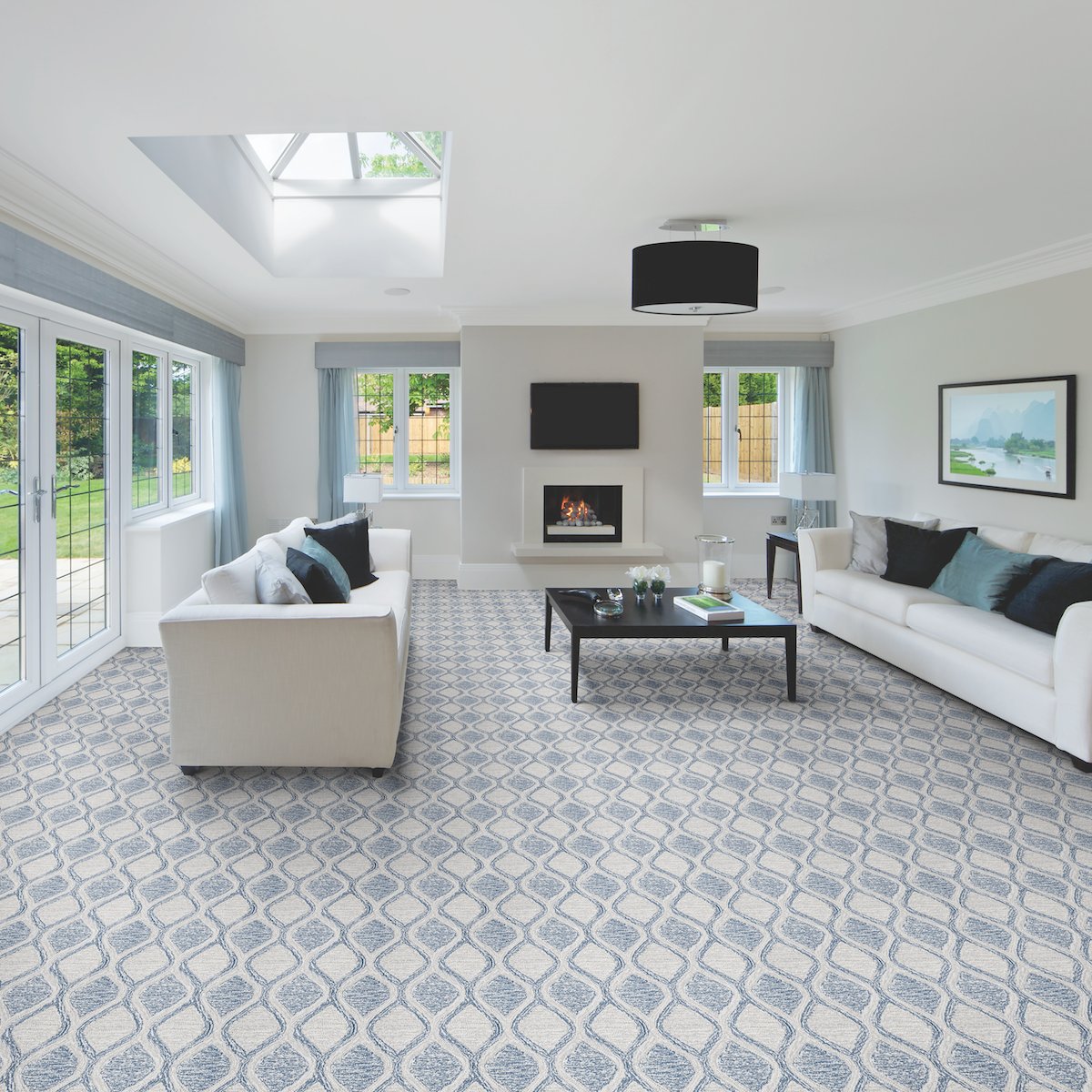 FCWMagazine's tweet photo. Here's a soft and cozy #DesignMonday! We love the lively pattern and blue hues of this carpet. The pattern, created in sumptuous hand-tufted loop pile of 100 percent wool, is equally fashionable as a custom rug or wall-to-wall installation. [📸: @Couristan] https://t.co/ZJ3OmVSazz
