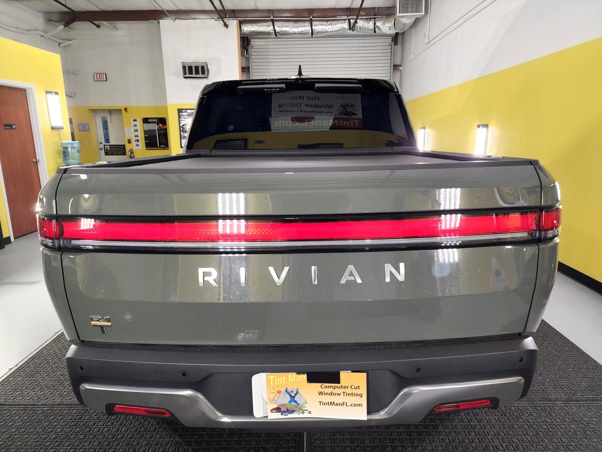 tintman's tweet photo. 2022 100% Electric Rivian R1T Pickup Truck Windows Tinted with Xpel Prime XR Black Ceramic Window Film at Tint Man FL's Winter Garden location @tintman #rivian #tintmanfl #xpel @xpel 70% windshield, 30% front doors, 55% on top of factory smoked rear windows &amp; 15% visor strip. https://t.co/A0H0vhq1Np