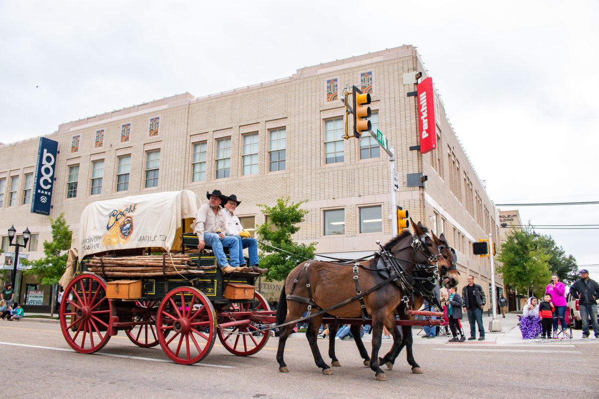 The view outside the #Amarillo Office was more western than usual as the Coors Country Club cattle drive made its way down Polk St. Local businesses &amp; the community congregate downtown for this annual event that celebrates the area's heritage. <a href="/coorscowboyclub/">Coors Cowboy Club</a> #BuildingCommunity