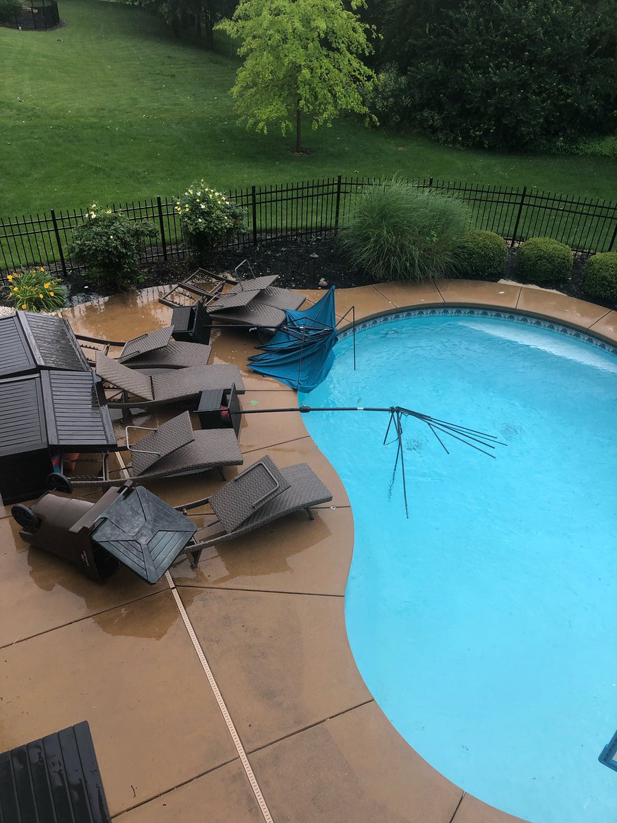 4dayspring's tweet photo. @NWSLouisville pics taken a little after 2pm in Goshen. Winds were so strong it flipped a garbage can over a brick wall, flipped over two tables weighted with 60 pounds of rock, and pulled outdoor curtains so hard it bent the brackets. https://t.co/NuNyK1lAFP