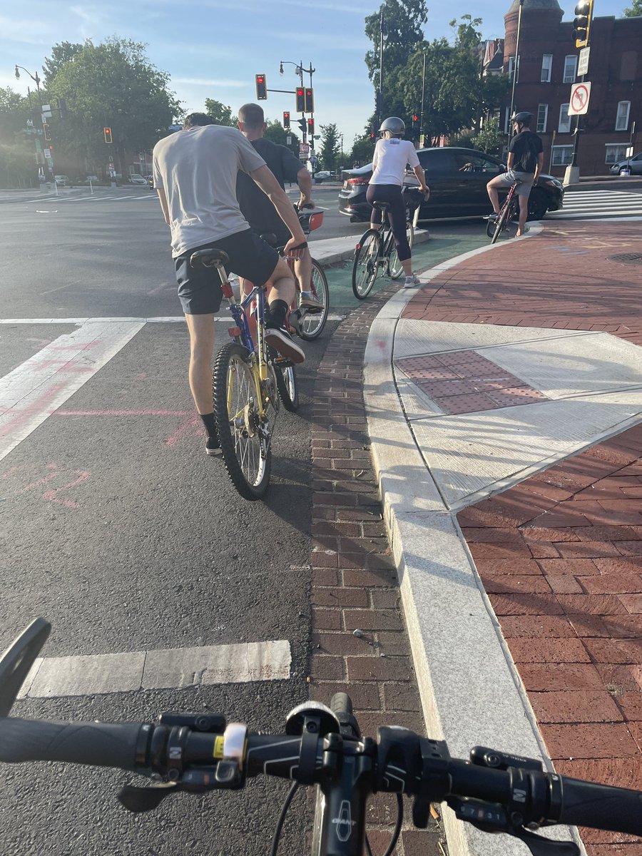 New Jersey Ave NW at New York at 7 tonight. 4/5 of us were going to R or further north. We didn’t all make it through the very short green bike signal phase. <a href="/WHands80/">Enhance Field</a>