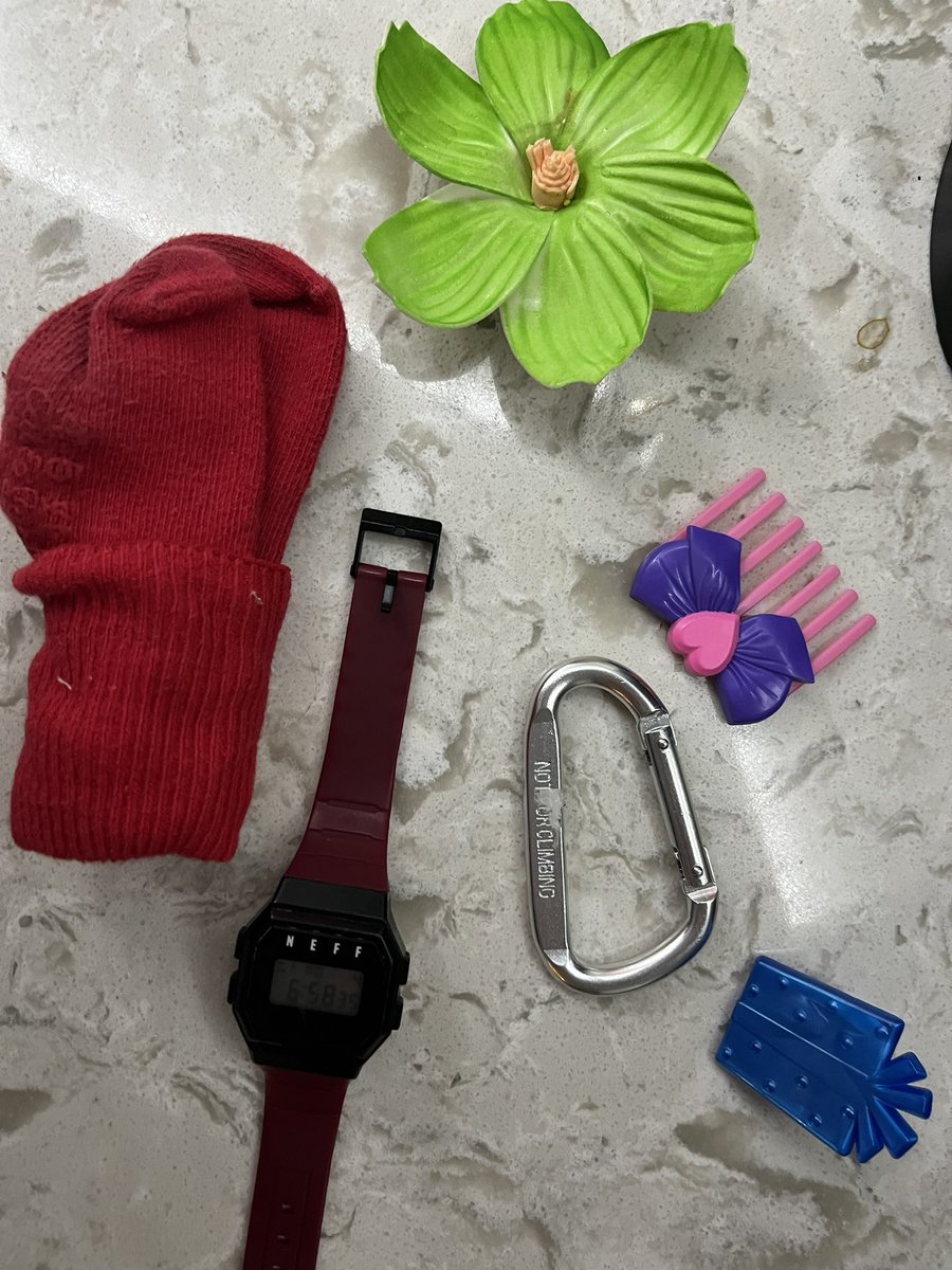 My daughter came home from preschool with some mysterious items in her backpack which apparently were “special gifts from my best friend.” Because nothing says friendship like a pair of red socks and an old watch. I just love kids. 💜