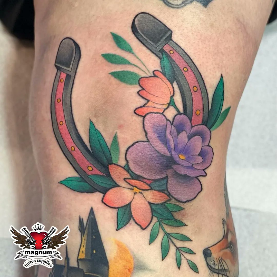 Horseshoe and Magnolia Lucky Tattoo by Justin Ryan Olivier  Tattoo Insider