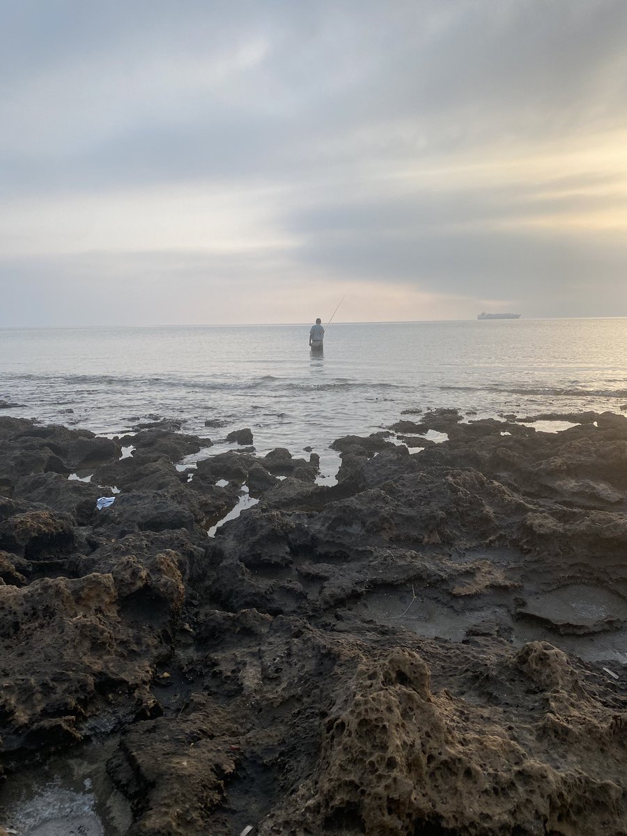 I Woke up at 6 am and went for a morning run. After 15 min, I arrived at the beach, and this guy was already there fishing. 
There is a lesson in that: No matter when you wake up, there is always someone else who had woken up before you and started grinding