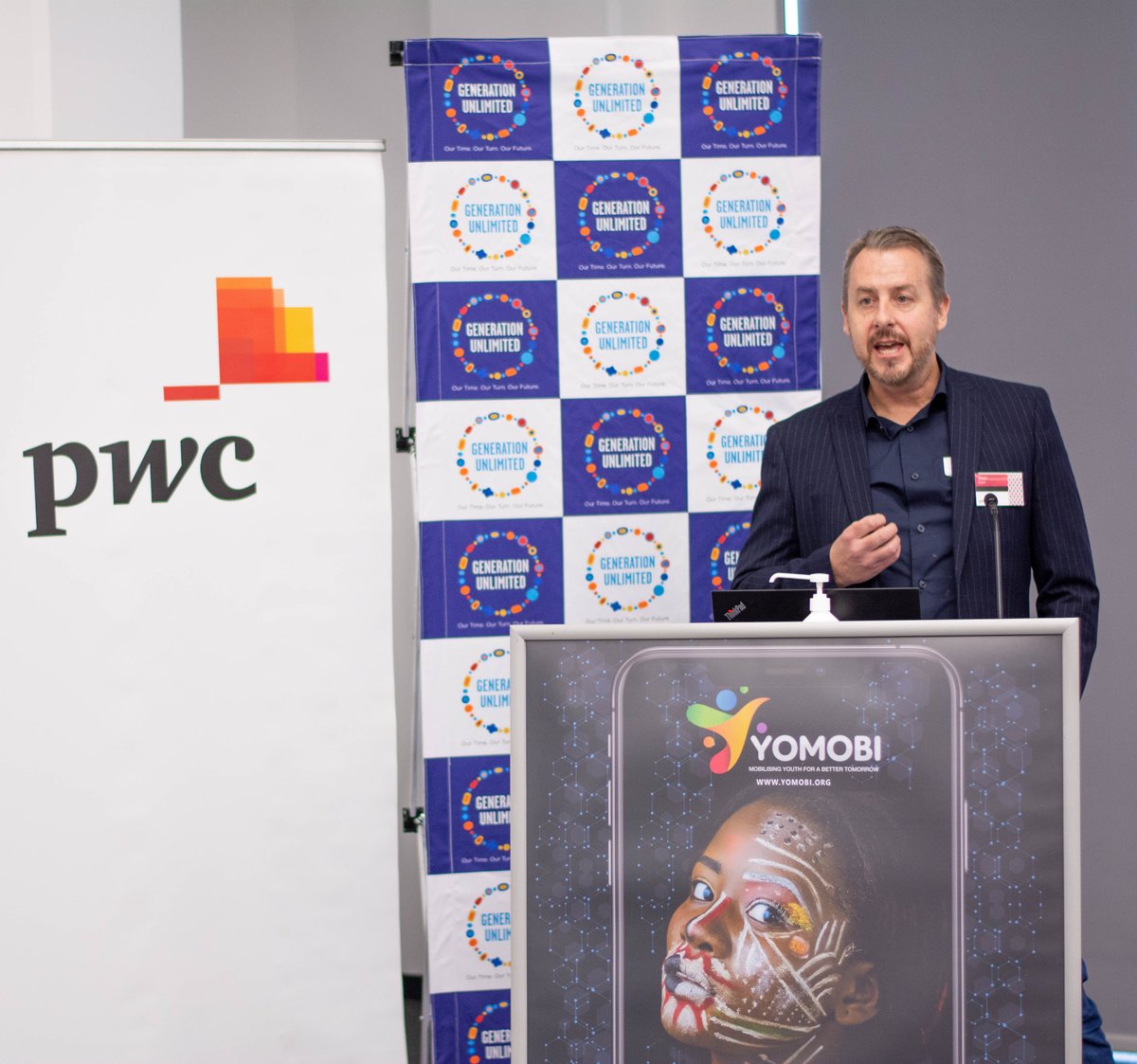 pwc_za's tweet photo. Jason Bygate, Senior Partner at #Capacitate Social Solutions walks the launch attendees through the #YoMobi application, giving civil society organisations the opportunity to gain all the necessary knowledge to bridge the digital divide. #YoMobilaunch https://t.co/qBnRXAvPED