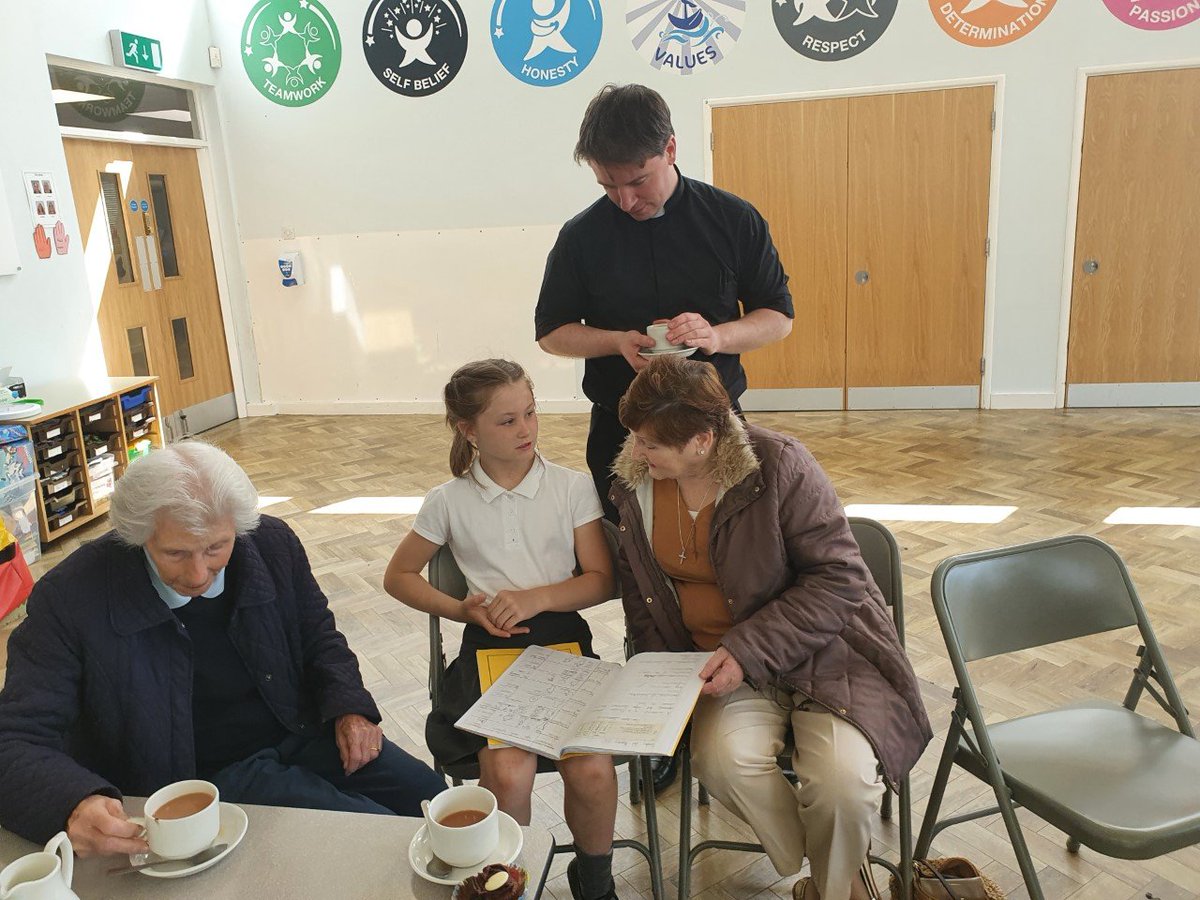 jude_primary's tweet photo. A massive thanks to our lovely parishioners who joined us in school after mass this morning. They were brilliant guests - they even made cake! Pupils thoroughly enjoyed chatting and sharing their RE work. #parishcommunity @StdunstansS  @bcpp @BhamDES https://t.co/yUeq9EsgJx