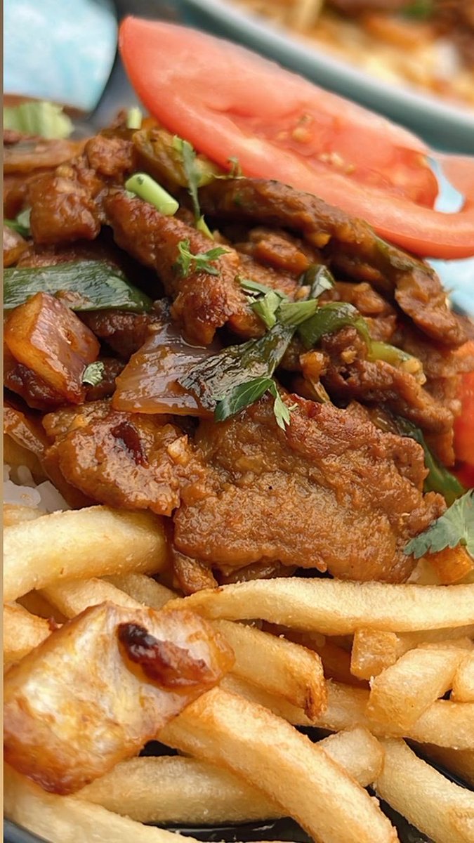 NextMeats_usa's tweet photo. People:
 “Vegan food is so boring.”

@chefreinasf 
Hold my…..Vegan Lomo Saltado.

—

Peruvian stir fry with marinated Next Skirt Steak, onions, tomatoes, and “secret ingredients” with French fries over rice.

#nextmeats #plantbased #vegan #govegan https://t.co/N3qi4cwWQ6