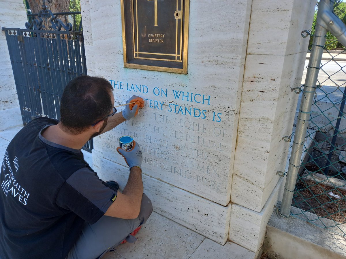 ChantzisNikos's tweet photo. Painting the letters of the columns in Rhodes war cemetery. @CWGC https://t.co/4GcHIMLHs3