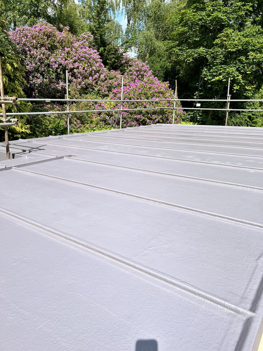 Polyroofnw's tweet photo. Standing seam roof effect in Polyroof protec system in sunny caldy today, awesome hard work by the lads to complete this in one day today @Polyroofnw #polyroof #pnwroofing #fiberglass #roofing https://t.co/IOf4sujaVG