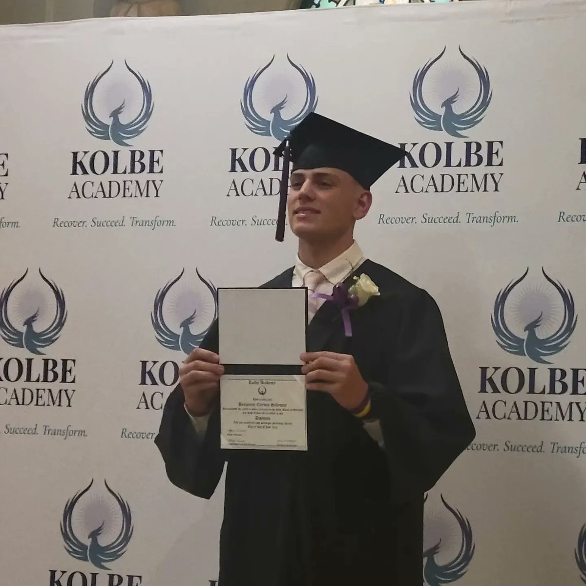 Kolbe_Academy's tweet photo. Great night celebrating our graduates, Sam and Ben. We are so proud of you both! #RecoverSucceedTransform #SaintsandScholars https://t.co/4NkeZ3zmht
