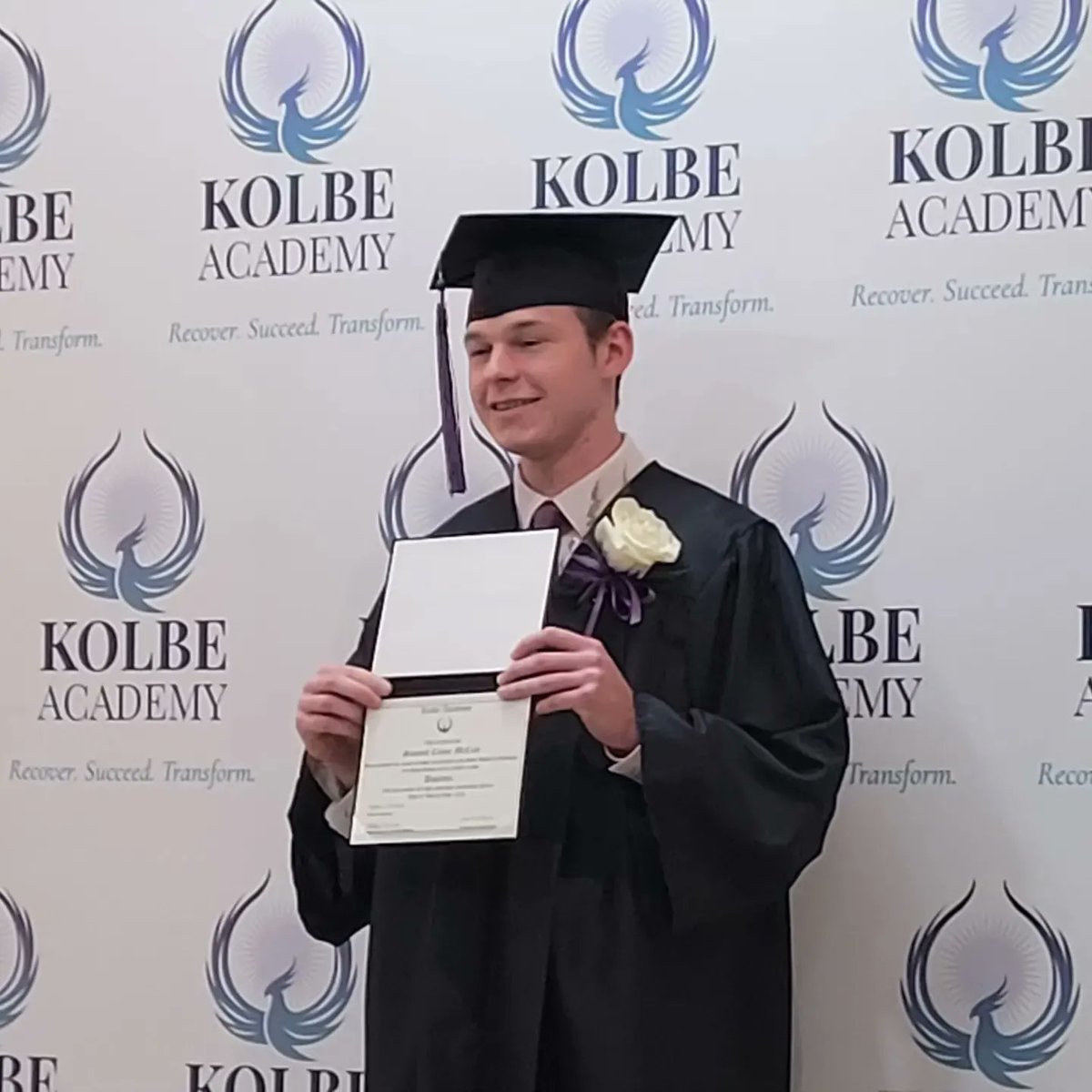 Kolbe_Academy's tweet photo. Great night celebrating our graduates, Sam and Ben. We are so proud of you both! #RecoverSucceedTransform #SaintsandScholars https://t.co/4NkeZ3zmht