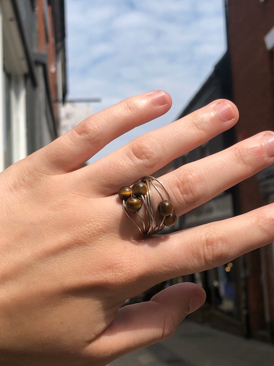 Nova_Silver's tweet photo. Our stunning beaded Tiger's Eye ring is the perfect addition to your summer days out. The mix of brown, black, yellow and orange tones create the realistic look of a tigers fur. 
Shop in store only!
.
.
.
#novasilver #tigerseye #ring #tigerring #norwich #jewellery #sterlingsilver https://t.co/Miyr3lPBjM