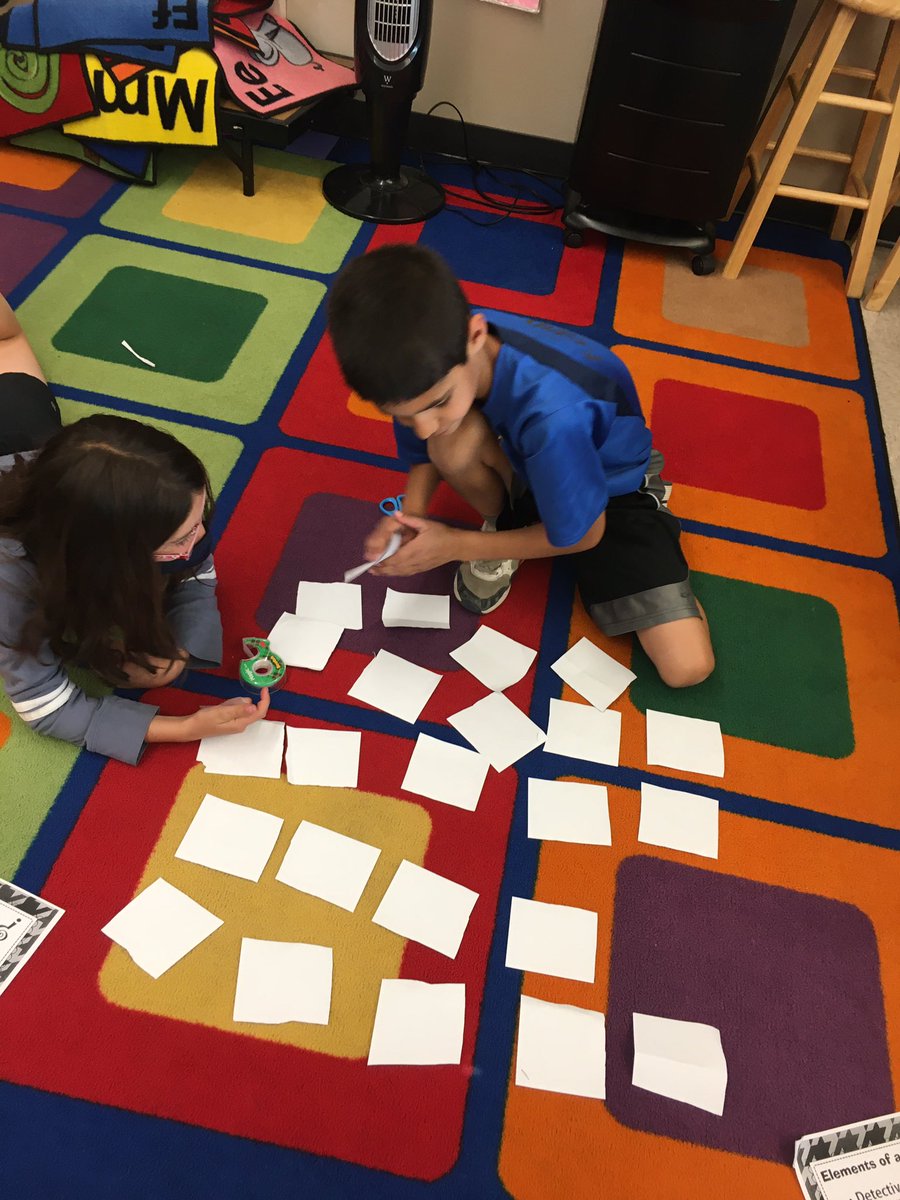 #3Chu playing a matching game to review elements of a mystery!