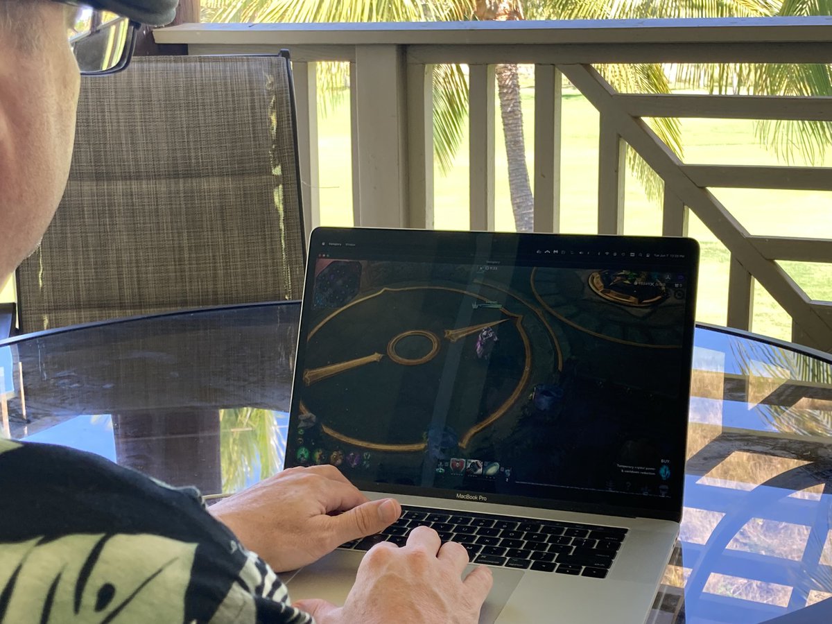 Hubby spending some quality time with the other love of his life…  😆😁 while basking in the breezy sunny day in HI.