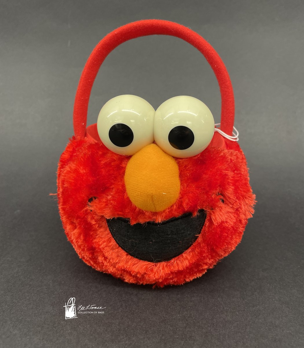 158/365: This bag features the familiar smile of Elmo. The Sesame Street character may identify as being 3.5 years old, but they were actually designed by Caroly Wilcox in 1979. 
