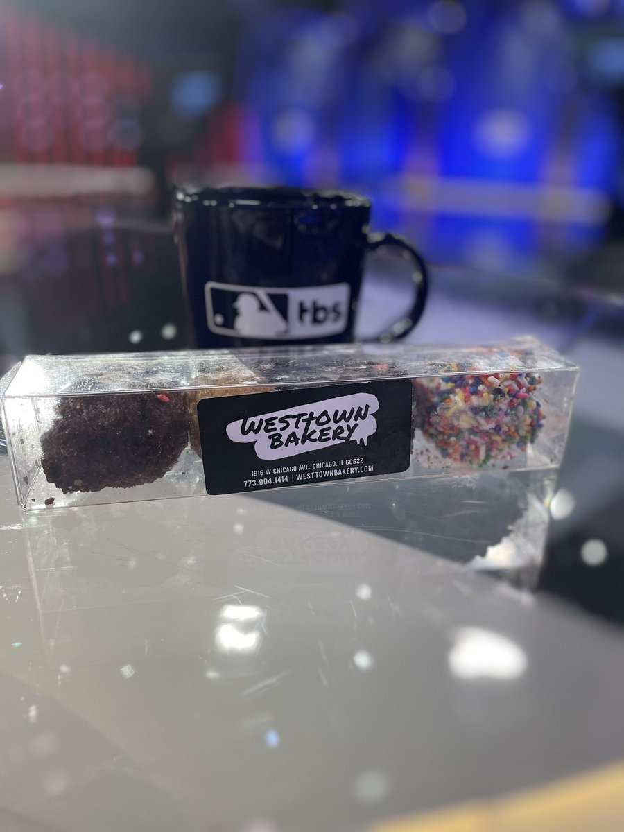 cgrand3's tweet photo. The cakeballs from @westtownbakery made the pregame show tonight.  Now it’s time to go eat and watch some baseball ⚾️ #MLBonTBS https://t.co/QCwxRT59bA