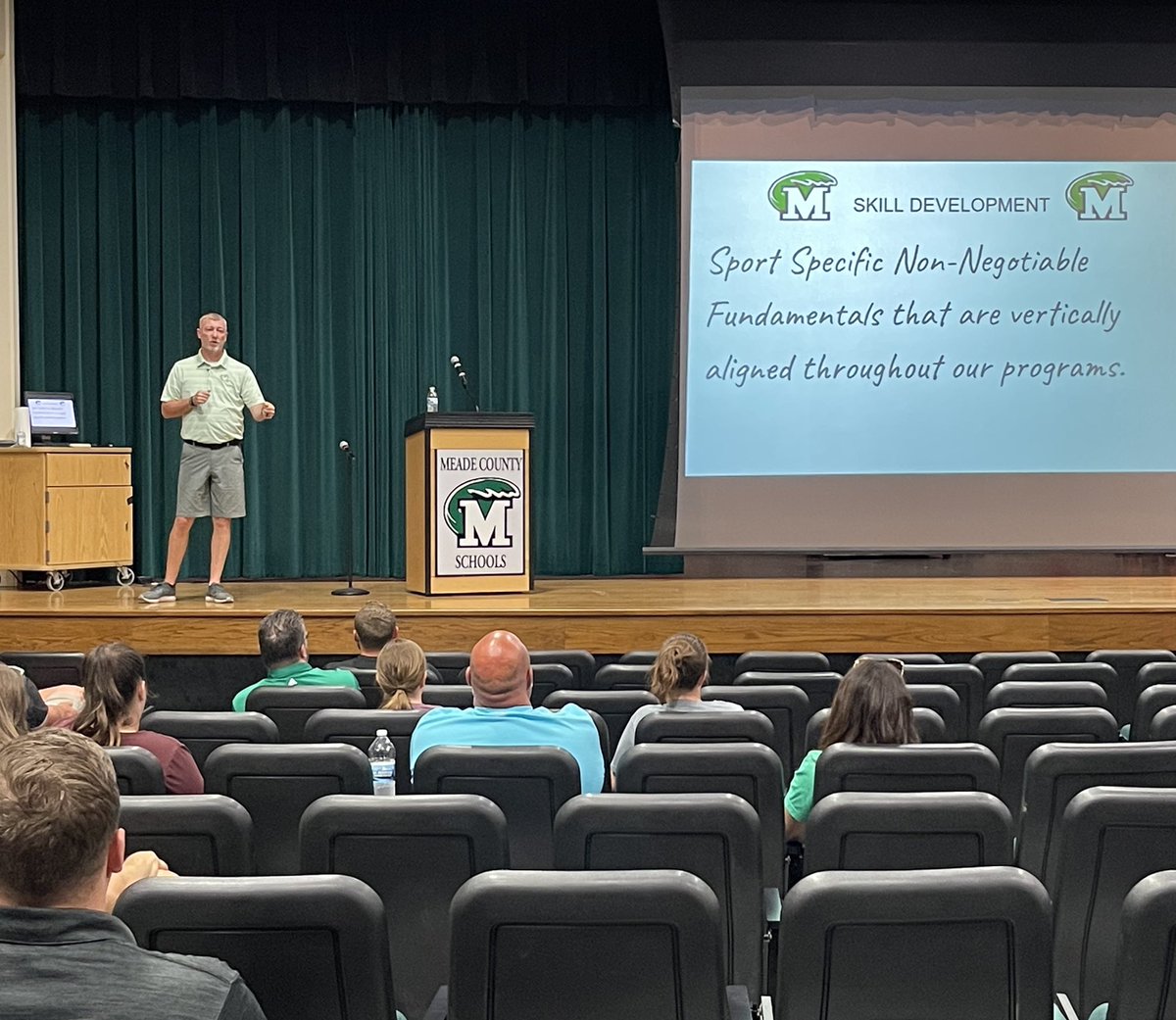JSchmidtMC's tweet photo. Building energy in our Greenwave Athletics Program @MEADECOUNTYHIGH with the inaugural “Making Waves” professional learning for Meade County coaches! A S/O to AD, Todd Clanton and our speakers tonight! 
Learning with and from our own is powerful! #WeAreMeade #MaximizingPotential https://t.co/c9pZKQ8WRM
