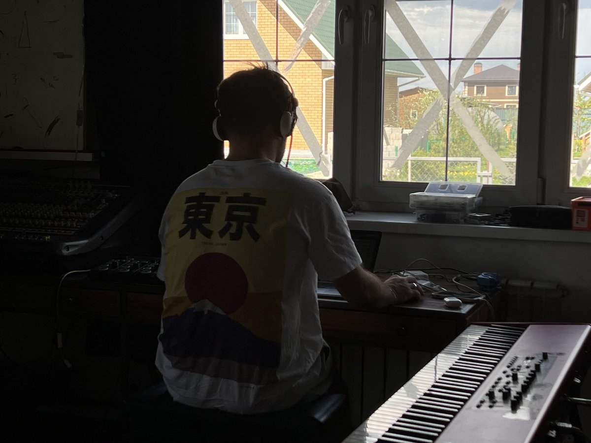 | 302 | Day 104 - 8:21 PM |
A man in headphones composing music in front of the windows cross taped with paper tape
 ----------
Add your window anonimously on tapewindow.org or tweet it with #wariscoserthanitappears to become a part of the charity NFT drop on 
<a href="/opensea/">OpenSea</a>🙃
