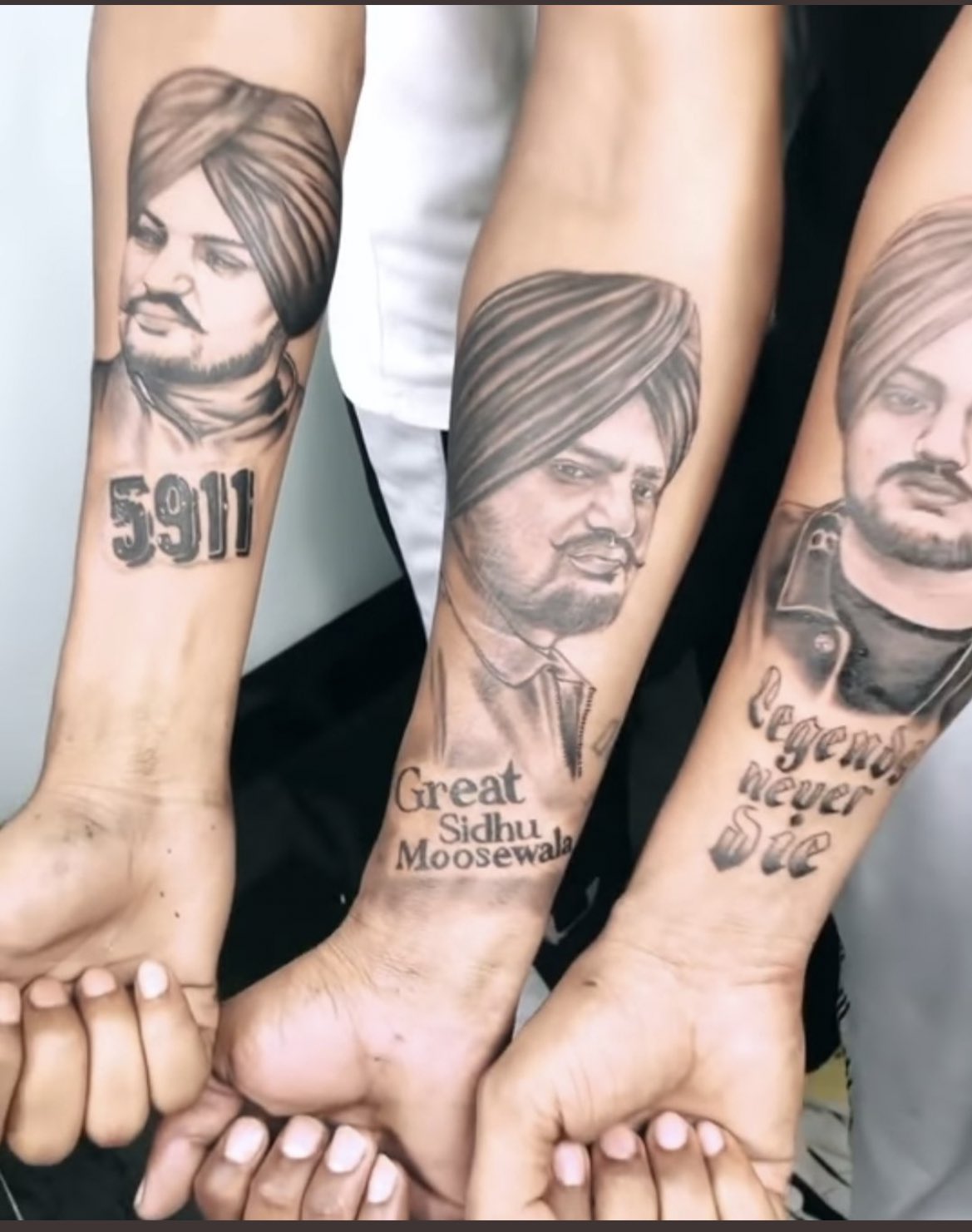 Sidhu Moose Wala's parents get tattooed to give tribute
