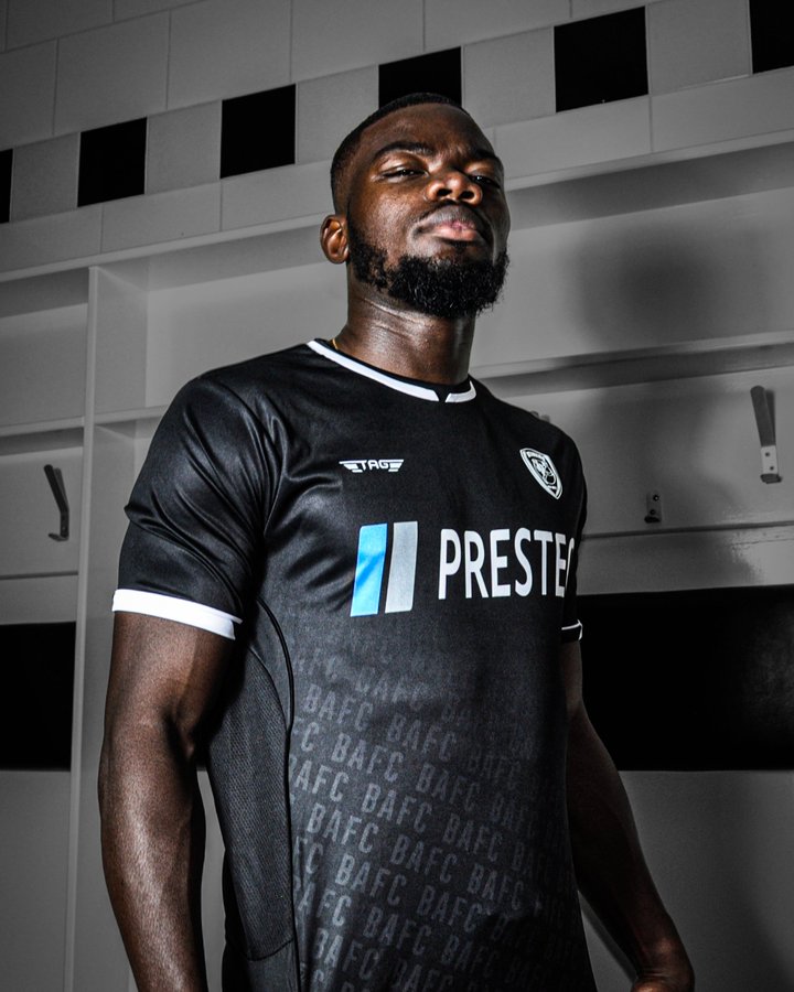 Deji Oshilaja models Burton Albion's 2022/23 away shirt, produced by TAG Sportswear