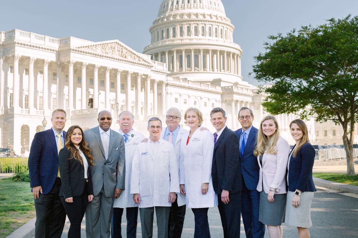 TheUSONetwork's tweet photo. Network physicians visited Capitol Hill in May to advocate on behalf of community oncology, urging @EnergyCommerce and @WaysMeansCmte to avert looming cuts to the Medicare Physician Fee Schedule &amp; support policies that remove patient access barriers to care. (1/2) https://t.co/Cq54giunN5