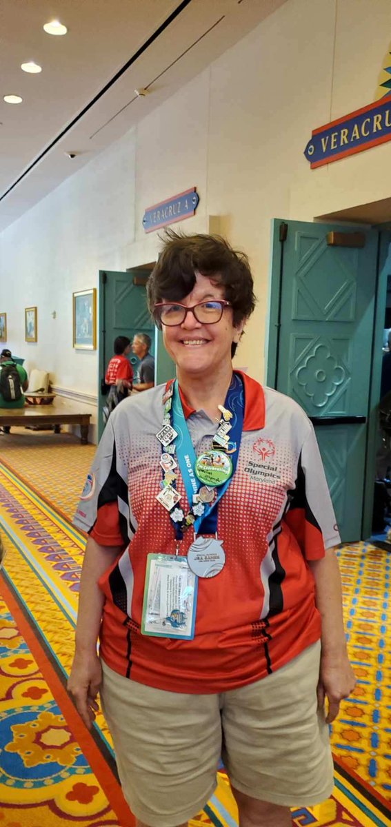Congrats to Linda for taking home the silver medal in bocce at the Special Olympics USA Games at Orlando. We are so proud!

[Image description: Linda is shown smiling for the camera while wearing her Special Olympics shirt and silver gold medal around her neck].