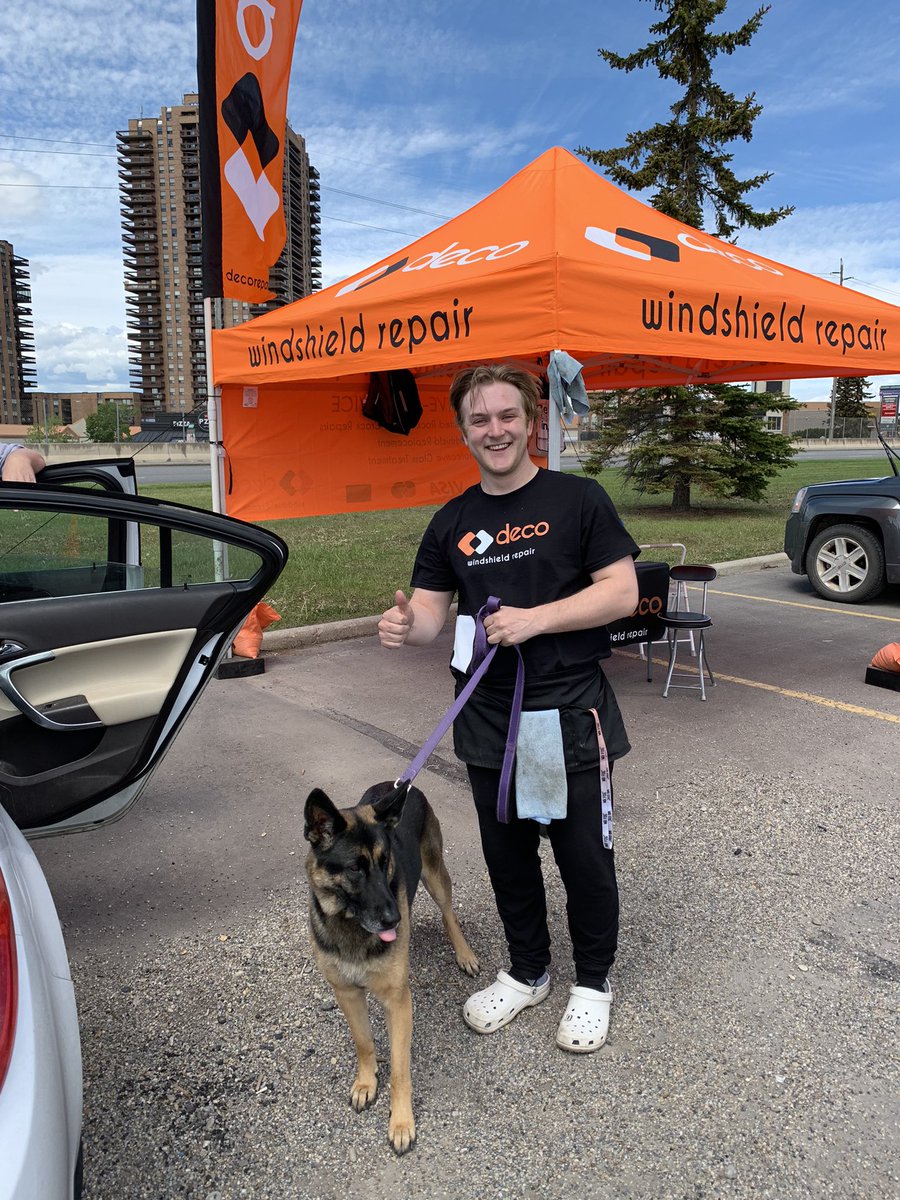 This is Dawson. He fixed the ding in Papa Allen’s windshield that Papa Doug put in it.  Dawson’s great!!!   He babysat me while Papas had to run into the store.  It only took 15 minutes to fix the windshield. #Calgary #GermanShepherd #Canada #traveling