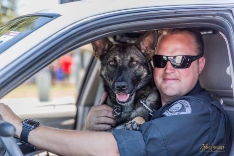 AnaheimPD's tweet photo. “A true friend leaves paw prints on your heart.” Happy National Best Friend Day from K9 Leo and his best friend Officer Klevos. https://t.co/JwUZ6W9Lcm