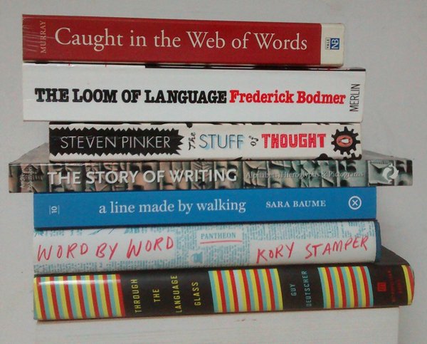 A spine poem for the 90th anniversary of the OED’s first completed edition. WALKING WORD BY WORD Caught in the web of words, The loom of language, The stuff of thought, The story of writing – a line made by walking word by word through the language glass. ~Stan Carey